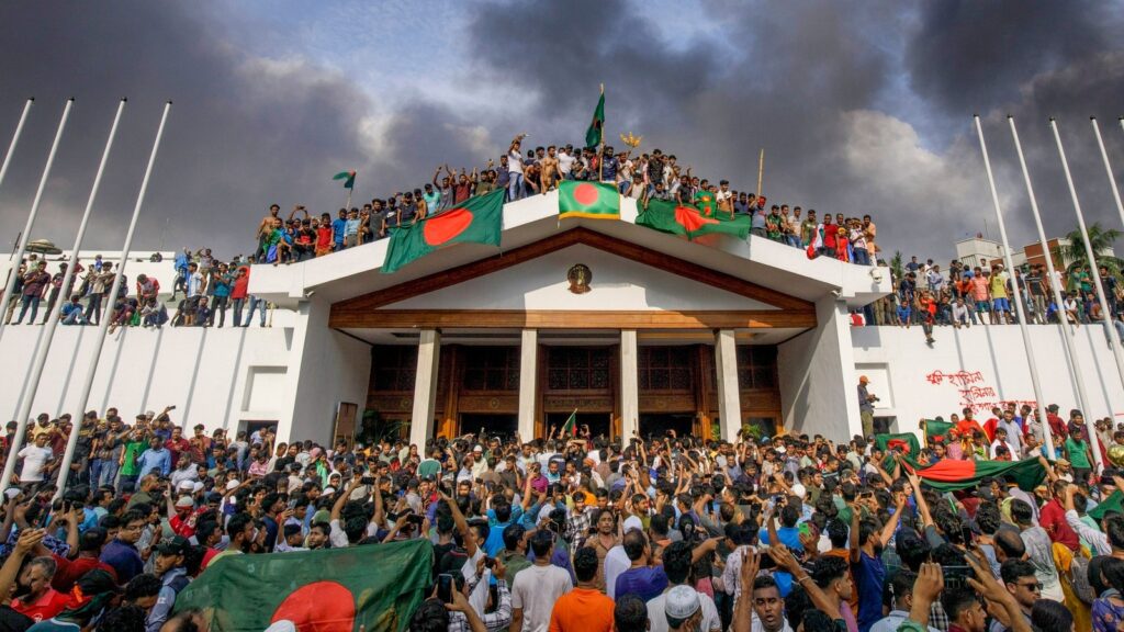 Dhaka People Gather Around The Residence Of Bang 1723018192824 1723018222302.jpg