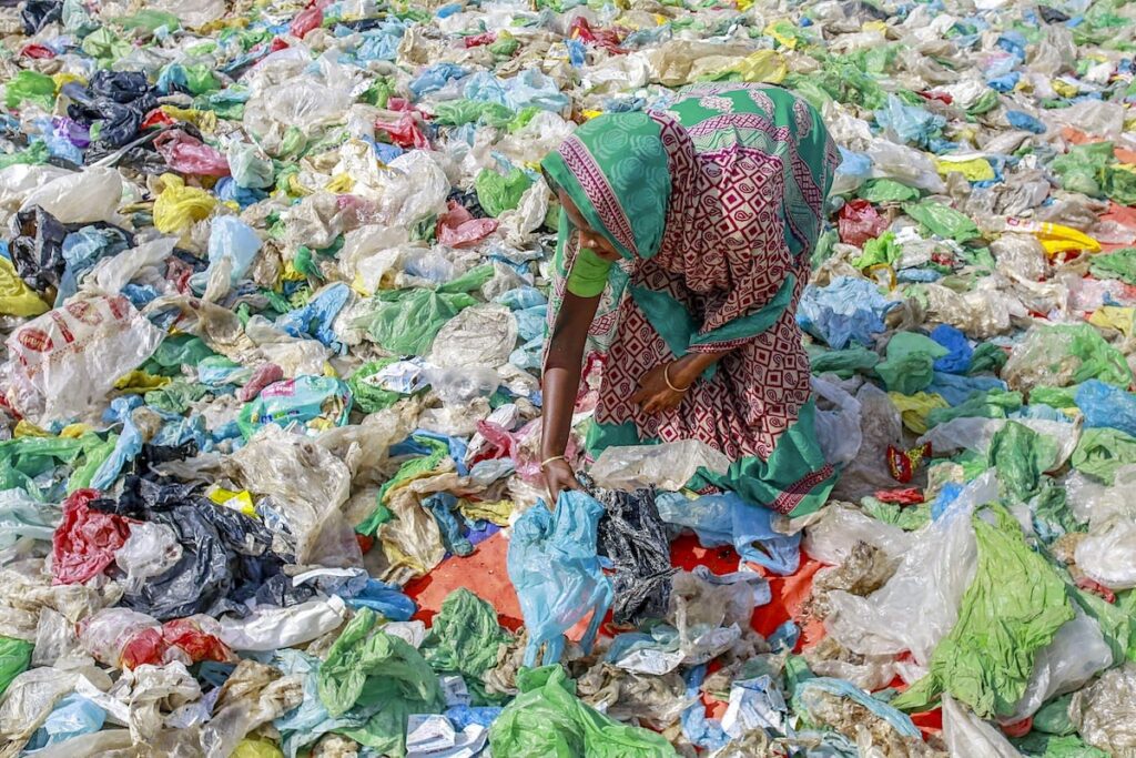 A Woman Sorts Out Plastic Bags Suvra Kanti Das Sipa Usa Alamy 2gm52w3 1200px Copy.jpeg