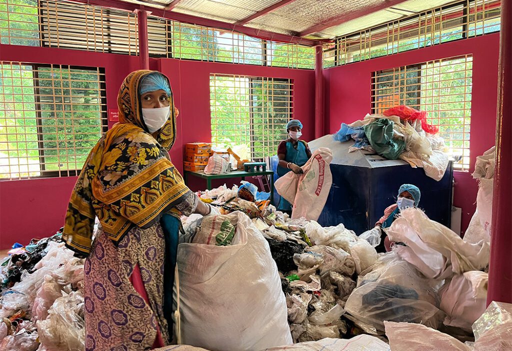 Workers sorting the single use plastcis.jpg